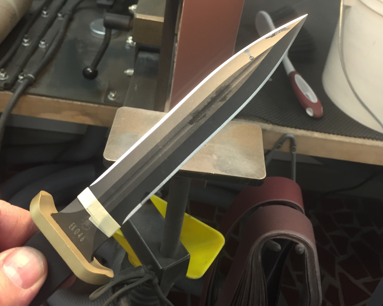 https://spartanbladesusa.com/product_images/uploaded_images/dagger-being-sharpened.jpg